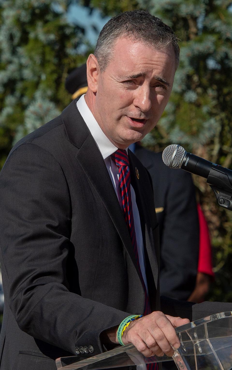 U.S. Congressman Brian Fitzpatrick speaks during the 20th anniversary of the 9/11 terror attacks, was held at the Garden of Reflection in Lower Makefield Township, on Saturday, Sept. 11, 2021.