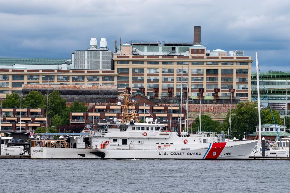 A US Coast Guard vessel sits in port in Boston Harbor across from the US Coast Guard Station Boston in Boston, Massachusetts, on June 19, 2023. A submersible vessel used to take tourists to see the wreckage of the Titanic in the North Atlantic has gone missing, triggering a search-and-rescue operation, the US Coast Guard said on June 19, 2023. It was not immediately known how many people are on the vessel, operated by a company called OceanGate Expeditions. 