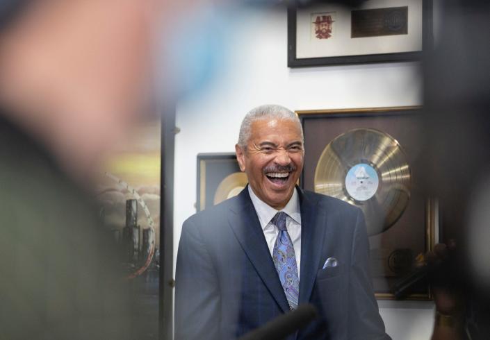 Huel Perkins laughs as the speaker cracks a joke at the Detroit National Association of Black Journalists press conference as NABJ celebrates their 40 year anniversary at WGPR Broadcast Museum in Detroit on August 18, 2022.