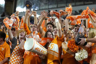 Tennessee fans cheer during the second half of the team's Orange Bowl NCAA college football game against Clemson, Friday, Dec. 30, 2022, in Miami Gardens, Fla. (AP Photo/Lynne Sladky)