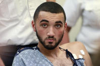 FILE - Emanuel Lopes is seated during his arraignment on two first degree murder charges, Tuesday, July 17, 2018, in district court in Quincy, Mass. The trial for Lopes, who plead not guilty, began Thursday, June 8, 2023 at Norfolk Superior Court in Dedham, Mass. (Greg Derr/The Quincy Patriot Ledger via AP, Pool, File)