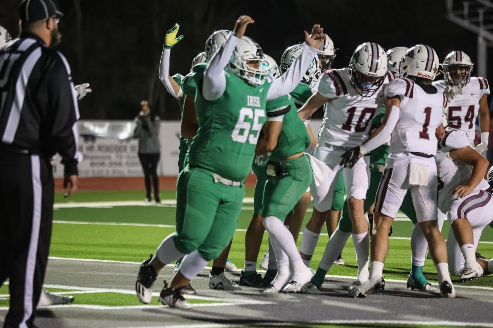 Shamrock’s Lazlo Alfaro (65) celebrates a touchdown during a District 2-2A Division II game against Clarendon, Friday, October 28,2022, at El Paso Field in Shamrock, Texas.  Clarendon won 23-20.