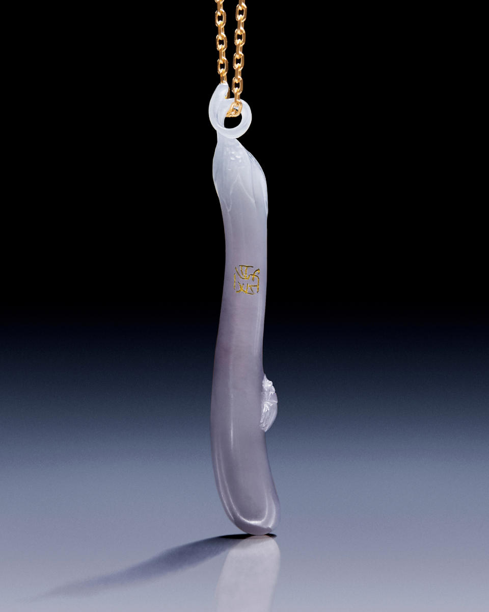 Loewe’s eggplant-shaped pendant carved by Qijing Qiu.