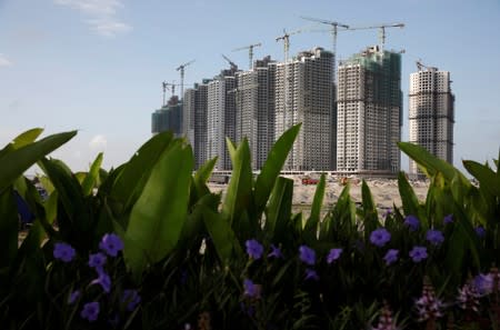 FILE PHOTO: Residential apartments under construction are pictured at Forest City in Johor