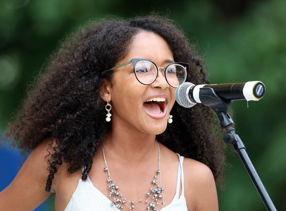 Aleesha Smith, 14, of Waterloo performs a vocal solo in the senior division during the 62nd Bill Riley Talent Search finals on the Anne and Bill Riley Stage at the Iowa State Fair on Sunday, August 21, 2022, in Des Moines.