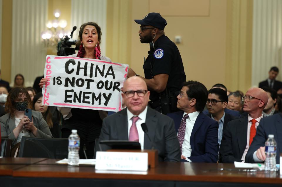 A protester disrupts the first hearing of the U.S. House Select Committee on Strategic Competition between the United States and the Chinese Communist Party as Lt. Gen. H.R. McCaster (Ret.) testifies at the Cannon House Office Building on February 28, 2023 in Washington, DC. The committee is investigating economic, technological and security competition between the U.S. and China.