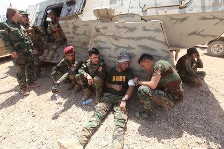 Kurdish Peshmerga forces gather on the southeast of Mosul, Iraq, August 14, 2016. REUTERS/Azad Lashkari