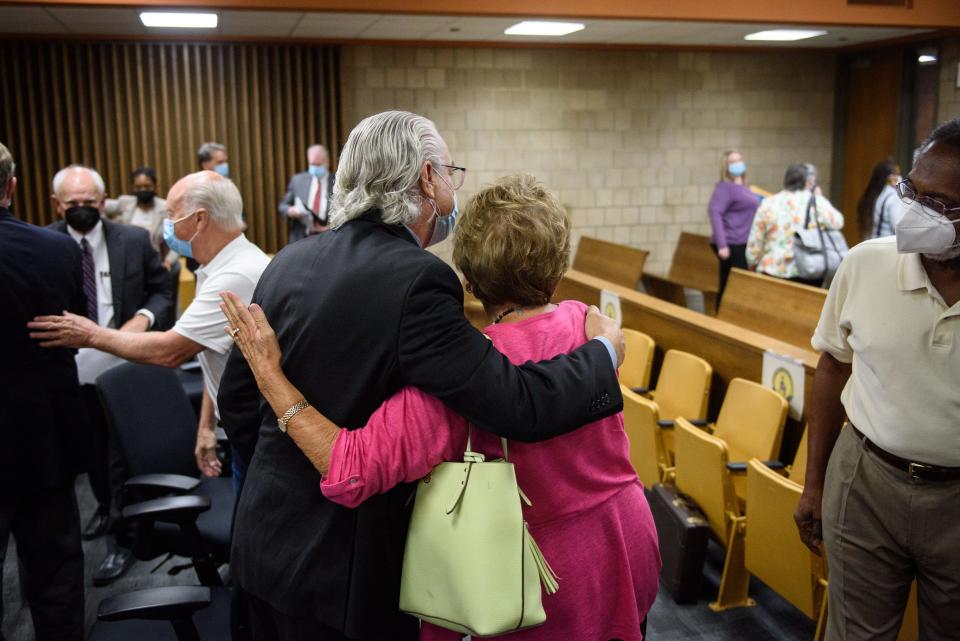 Plaintiff Suzanne Pennink hugs attorney Lonnie Player after Judge Jim Ammons decides in the plaintiffs favor that Vote Yes referendum will be on the November election ballot.