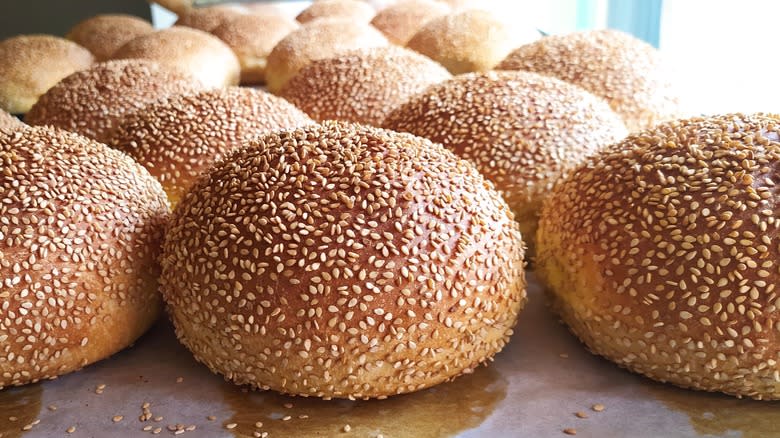 Sesame rolls on table