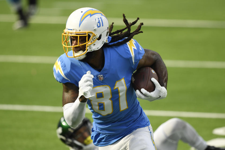 Baby blue Chargers uniforms with white helmets