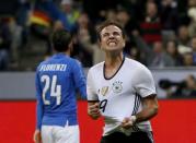 Football Soccer - Germany v Italy - International Friendly - Allianz-Arena, Munich, Germany - 29/3/16 Germany's Mario Goetze celebrates after scoring the second goal against Italy REUTERS/Michaela Rehle