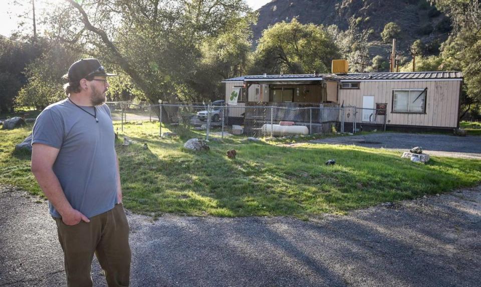 Lifelong El Portal Trailer Park resident Luke Harbin takes a look at his mother’s mobile home while getting ready to move out of the park on Sunday, March 13, 2022.