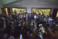 Former Malaysia Prime Minister Najib Razak, centre, speaks to journalists, before leaving the Kuala Lumpur High Court complex in Kuala Lumpur, Malaysia, Tuesday, July 28, 2020. The court has sentenced Razak to serve 12 years in prison after finding him guilty in the first of several corruption trials linked to the multibillion-dollar looting of a state investment fund that brought down his government two years ago. (AP Photo)