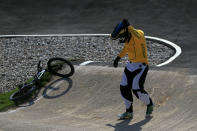 Khalen Young of Australia holds his head after crashing during the Men's BMX Cycling Quarter Finals on Day 13 of the London 2012 Olympic Games at BMX Track on August 9, 2012 in London, England. (Getty Images)