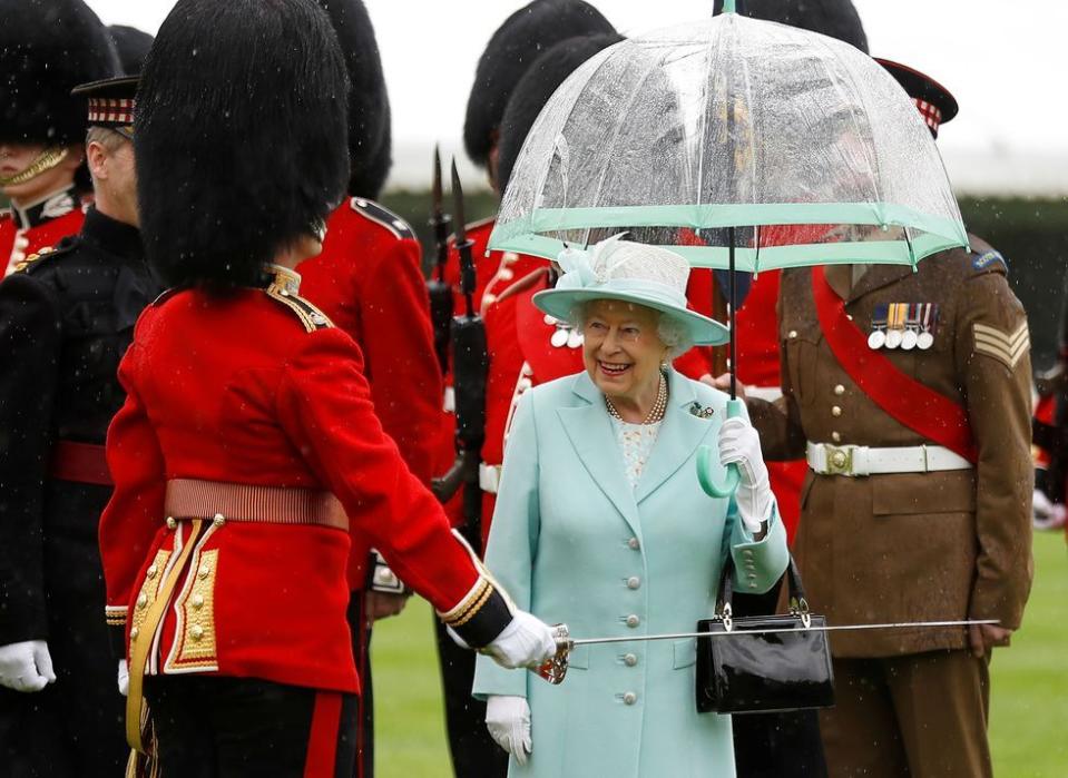 <p>During an inspection of the Scots Guards, Queen Elizabeth, dressed in head-to-toe mint, carried a particularly great matching umbrella.<br></p>