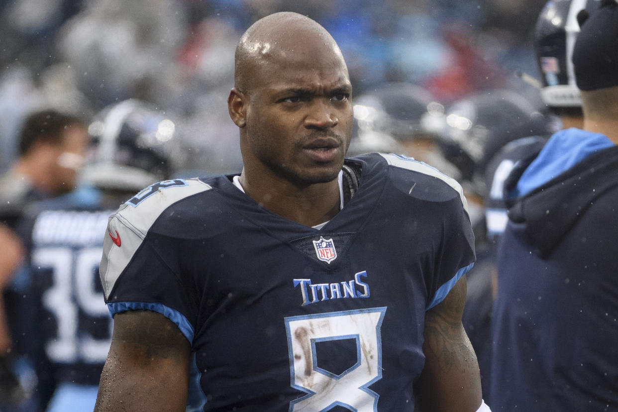 Adrian Peterson struggled to produce in three games with the Titans. (AP Photo/John Amis)