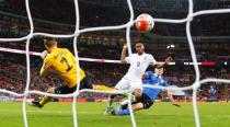 Football - England v Estonia - UEFA Euro 2016 Qualifying Group E - Wembley Stadium, London, England - 9/10/15 England's Raheem Sterling scores their second goal Reuters / Darren Staples