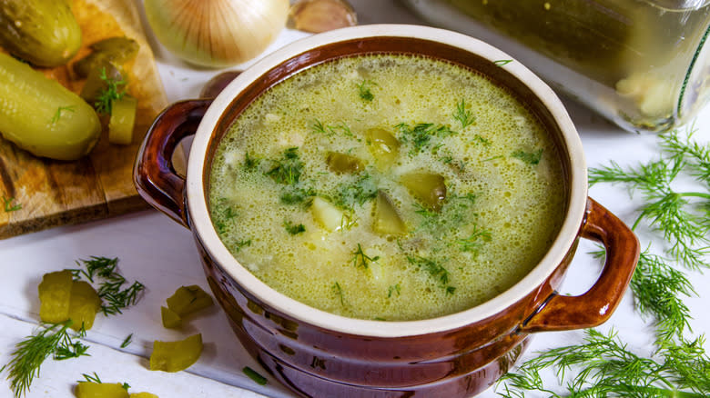 Pickle soup in brown pot