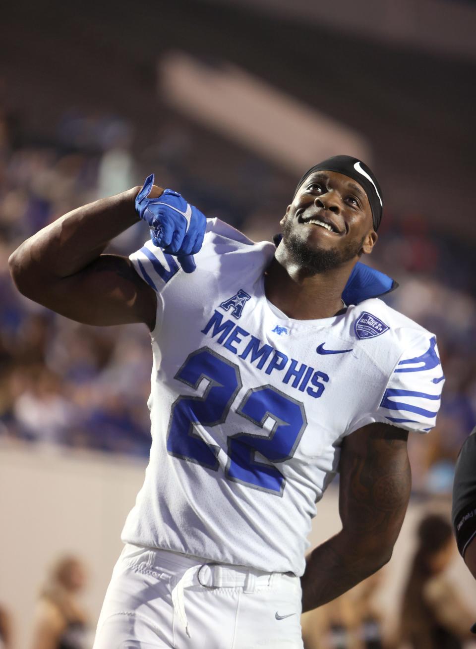 Memphis Tigers defensive lineman Jaylon Allen greet fans during the Friday Night Stripes spring football game at Liberty Bowl Memorial Stadium on Friday, April 22, 2022. 