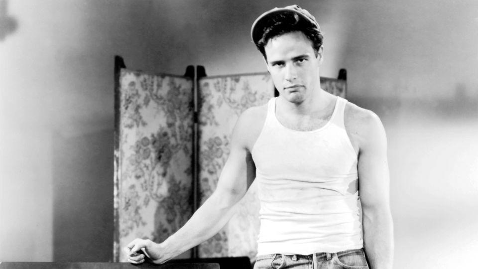 Marlon Brando wearing a white tank top in "A Streetcar Named Desire" in 1951. - Warner Bros/Kobal/Shutterstock