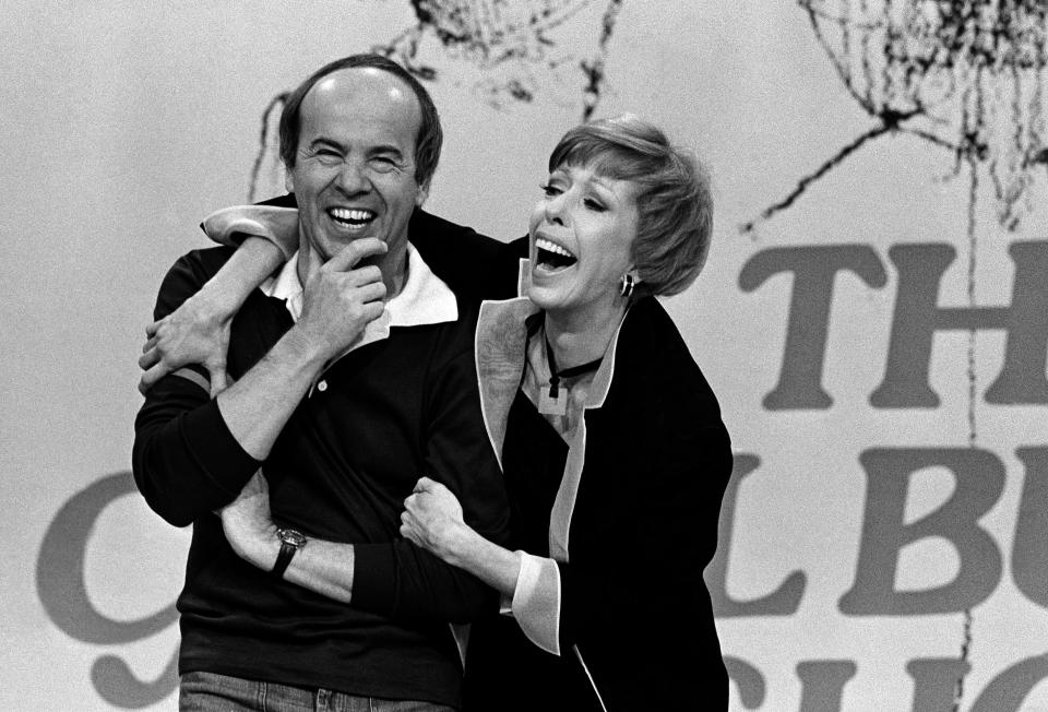 FILE - In this March 19, 1978 file photo, Carol Burnett, right, laughs with Tim Conway during taping of her final show, in Los Angeles. Conway, the stellar second banana to Burnett who won four Emmy Awards on her TV variety show, died Tuesday, May 14, 2019, according to his publicist. He was 85. (AP Photo/ George Brich, File)