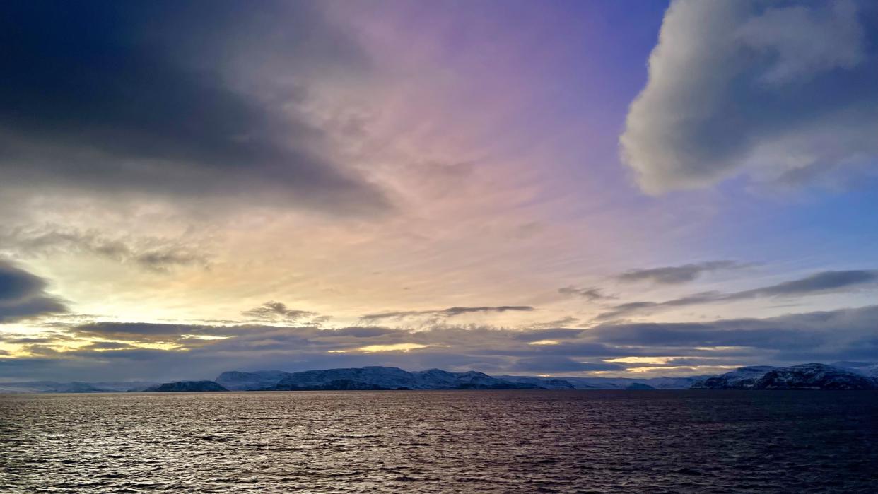  Purple and yellow sky during one morning aboard the Hurtigruten Coastal Express. 