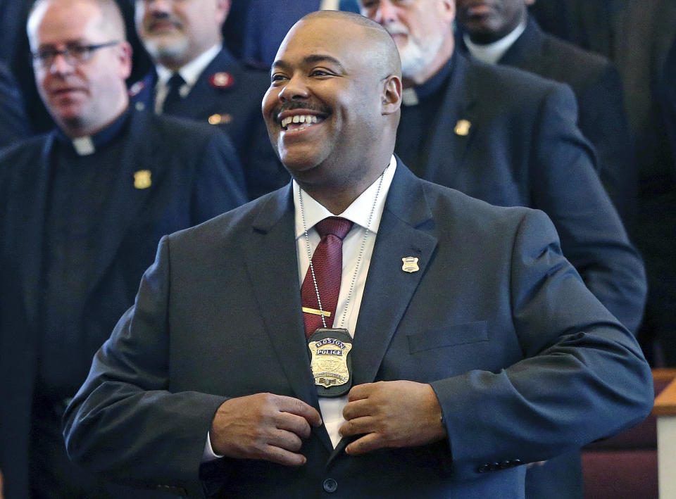 FILE - In this Aug. 6, 2018, file photo, William Gross smiles after being sworn in as Boston's first Black police commissioner during ceremonies in Boston. Gross retired on Jan. 29, 2021. (AP Photo/Elise Amendola, File)