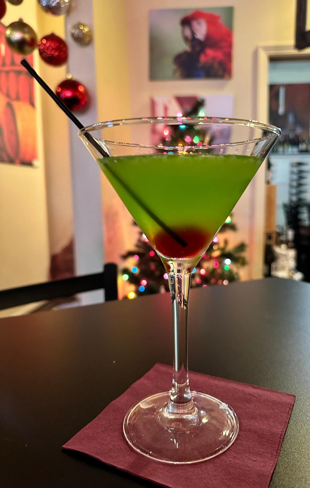 This Grinch cocktail at Grapes in a Glass features the tart combination of melon liquor, vodka, simple syrup and lemon juice.