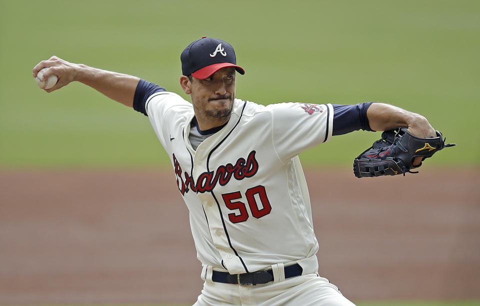 Atlanta Braves pitcher Charlie Morton works against the New York Mets in the first inning of a baseball game Sunday, Oct. 3, 2021, in Atlanta. (AP Photo/Ben Margot)