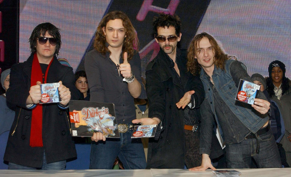 The Darkness arrive at HMV Oxford Street before signing copies of their new Christmas single, 'Christmas Time (Don't Let the Bells End)' in store, over breakfast with fans. The single is currently leading the race for the top spot in the Christmas sales charts.