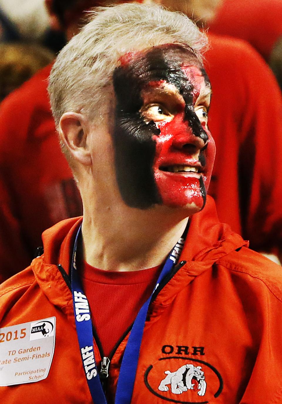 Old Rochester athletic director Bill Tilden got a Bulldog "paint job" at half-time to help bring home the Old Rochester victory over Pentucket.