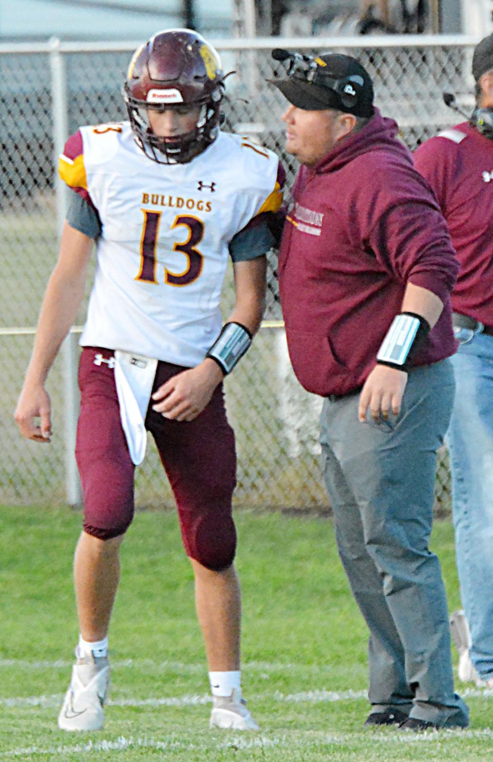 Head coach Brendon Pitts, quarterback Britt Carlson and the De Smet High School football team host Colome on Thursday in the opening round of the state Class 9B playoffs.