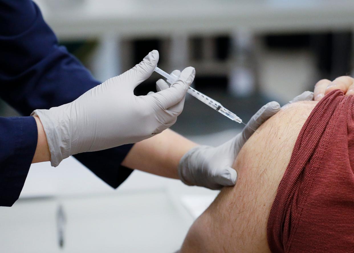 Patients receive COVID-19 vaccines at the mass vaccination facility inside Ohio State University's Schottenstein Center in Columbus on Tuesday, March 9, 2021. 