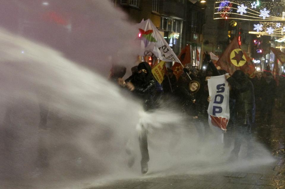 Riot police use water cannons to disperse demonstrators during a protest against internet censorship in Istanbul
