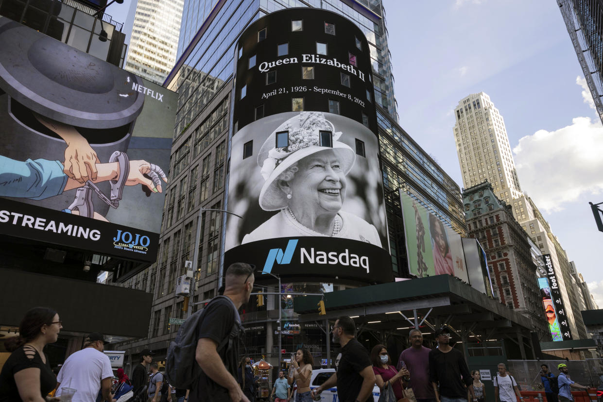 A photo of Britain's longest-serving monarch Queen Elizabeth II is displayed on the Nasdaq billboard in Times Square, Thursday, Sept. 8, 2022, in New York. (AP Photo/Yuki Iwamura)