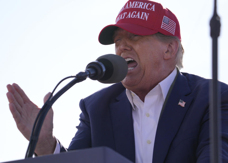 FILE - Republican presidential candidate former President Donald Trump speaks at a campaign rally March 16, 2024, in Vandalia, Ohio. Trump's anti-immigrant rhetoric appears to be making inroads even among some Democrats, a worrying sign for President Joe Biden. (AP Photo/Jeff Dean, File)