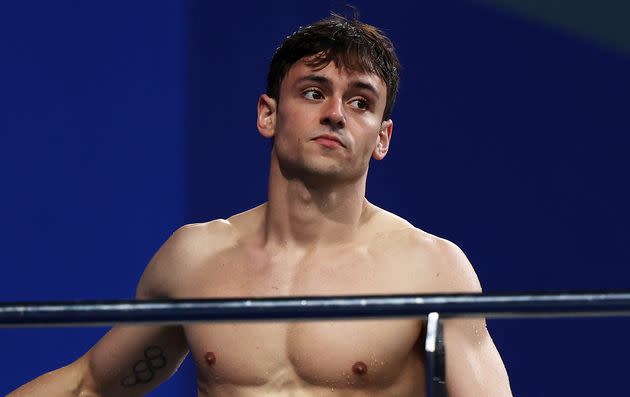 Tom Daley, ici au mois de juillet à Tokyo, a de quoi se protéger. (Photo: Clive Rose via Getty Images)