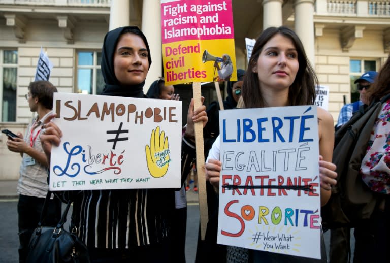 Women join a demonstration outside the French Embassy in London on August 26, 2016