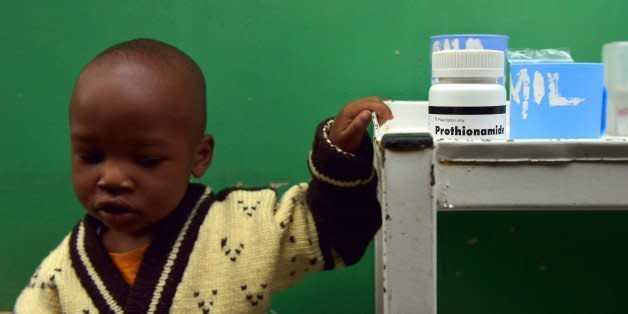 John, 3, who suffers from multi-drug-resistant tubeculosis (MDR-TB), waits by a medicine trolley for his medication to be prepared at a Medecins Sans Frontieres (MSF)-run clinic in Nairobi on March 24, 2015, World Tubeclosis Day. Globally, TB continues to kill 1.5 to 2 million people each year and remains the leading cause of death in people with HIV. In 2013, there were 90,000 new cases of TB diagnosed in Kenya and an estimated 20,000 cases went undetected. AFP PHOTO / TONY KARUMBA        (Photo credit should read TONY KARUMBA/AFP/Getty Images) (Photo: )