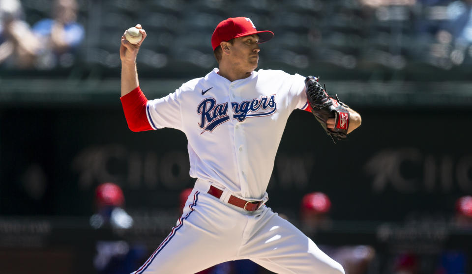 Texas Rangers starting pitcher Kyle Gibson throws during the first inning of a baseball game against the Toronto Blue Jays, Wednesday, April 7, 2021, in Arlington, Texas. (AP Photo/Brandon Wade)