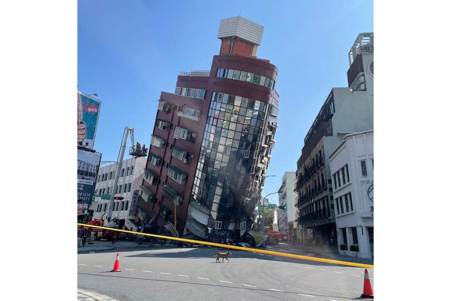 In this photo released by the Hualien City Government, a leaning building is cordoned off in the aftermath of an earthquake in Hualien, eastern Taiwan on Wednesday, April 3, 2024. Taiwan’s strongest earthquake in a quarter century rocked the island during the morning rush Wednesday, damaging buildings and creating a tsunami that washed ashore on southern Japanese islands. (Hualien City Government via AP)