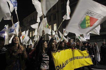 Demonstrators march during a protest in Lisbon March 6, 2014. REUTERS/Hugo Correia