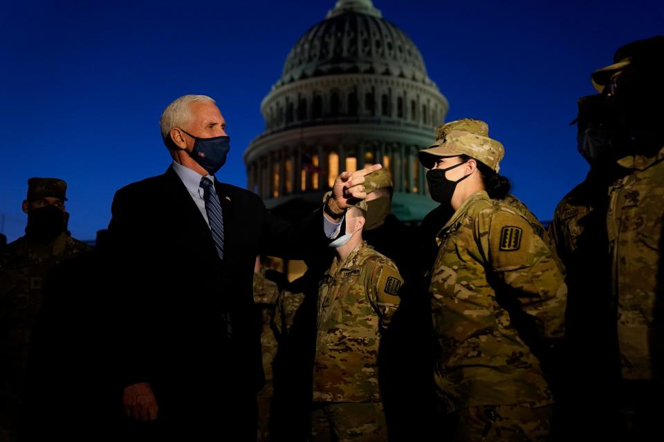 Vice President Mike Pence speaks to National Guard troops outside the U.S. Capitol, Thursday, Jan. 14, 2021, in Washington.