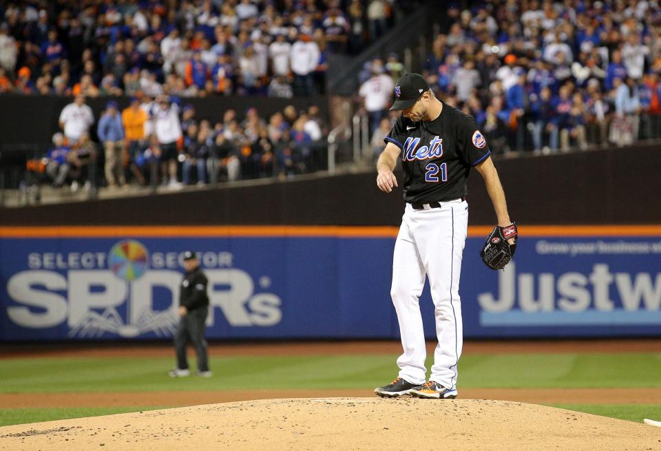 New York Mets starting pitcher Max Scherzer (21) reacts after giving up a two run home run to San Diego Padres first baseman Josh Bell (not pictured) in the first inning during game one of the Wild Card series for the 2022 MLB Playoffs at Citi Field.