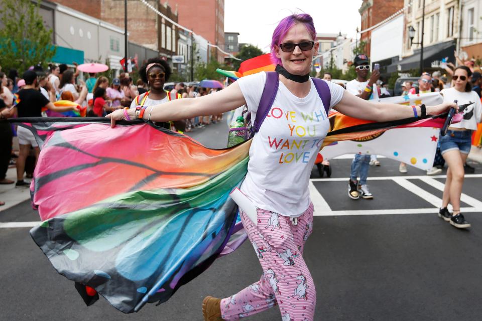 FILE - The inaugural Athens Pride Parade passes through downtown Athens, Ga., on Sunday, June 12, 2022.