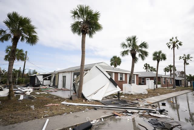 <p>Sean Rayford/Getty</p> Storm damage in the aftermath of Hurricane Milton on Oct. 10, 2024 in Venice, Florida