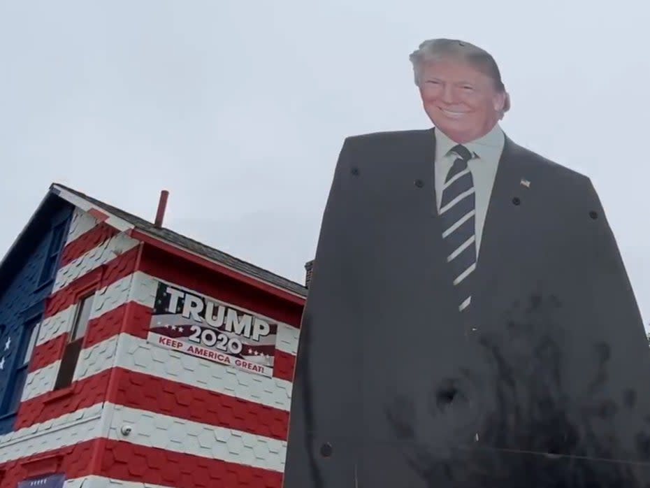 <p>14-foot metal version of the president sits in the houses front garden</p>York Daily Record