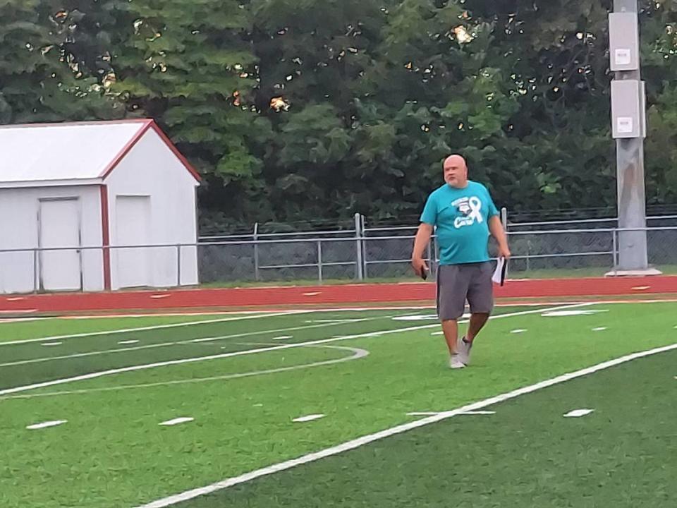 Highland boys soccer coach Jay Robertson leads the team through a conditioning drill during practice Tuesday, Aug. 15, at Highland High School. Jonathan Duncan/For The News Leader