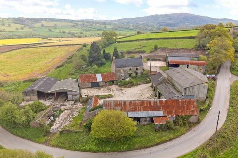 Farmhouse and buildings in countryside