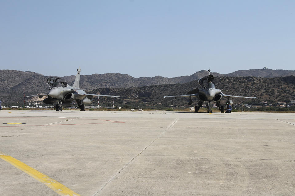 CORRECTS SPELLING OF DEFENCE In this photo provided by the Greek National Defence, two French Rafale fighter jets at Souda airbase on the island of Crete, Thursday, Aug. 13, 2020. Greece's prime minister warmly thanked France Thursday for its decision to boost its military presence in the eastern Mediterranean, where Greek and Turkish warships are closely shadowing each other over a Turkish energy exploration bid in waters Athens claims as its own. (Hellenic National Defence via AP)